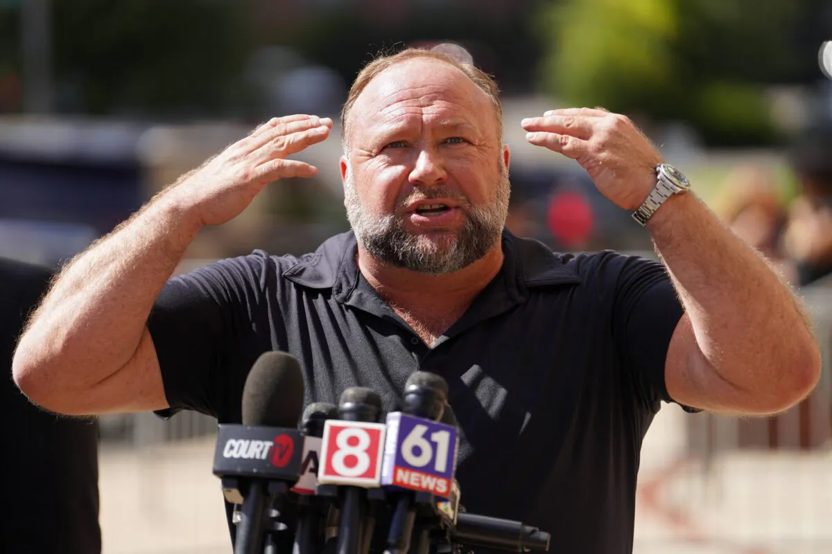 InfoWars founder Alex Jones speaks to the media outside Waterbury Superior Court during his trial in Waterbury, Conn., on Sept. 21, 2022. (Joe Buglewicz/Getty Images)