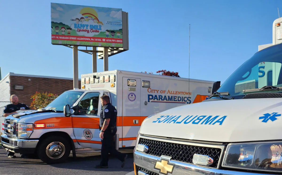Emergency responders work on the scene of an apparent carbon monoxide leak at a day care center in Allentown, Pa., on Oct. 11, 2022. (Zach DeWever/WFMZ-TV via AP)