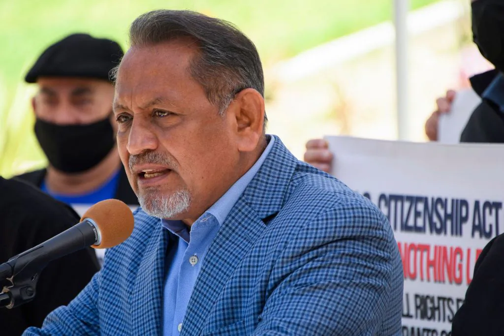 Los Angeles City Councilman Gil Cedillo (L) speaks about the US Citizenship Act of 2021 and urges action on US President Biden's immigration reform plan outside of City Hall in Los Angeles on April 29, 2021. (Patrick T. Fallon/AFP via Getty Images)