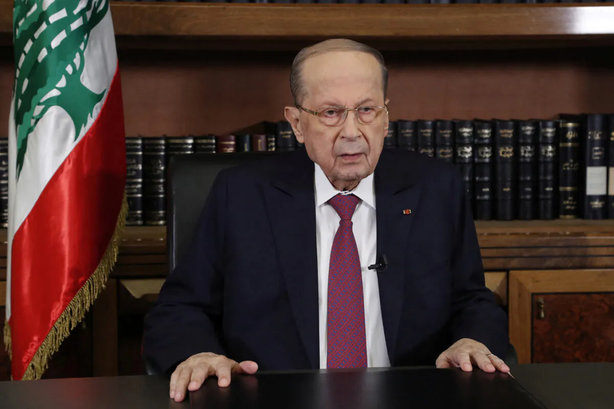 Lebanon's President Michel Aoun delivers a televised speech at the presidential palace in Baabda, Lebanon, on Dec. 27, 2021. (Dalati Nohra/Handout via Reuters)