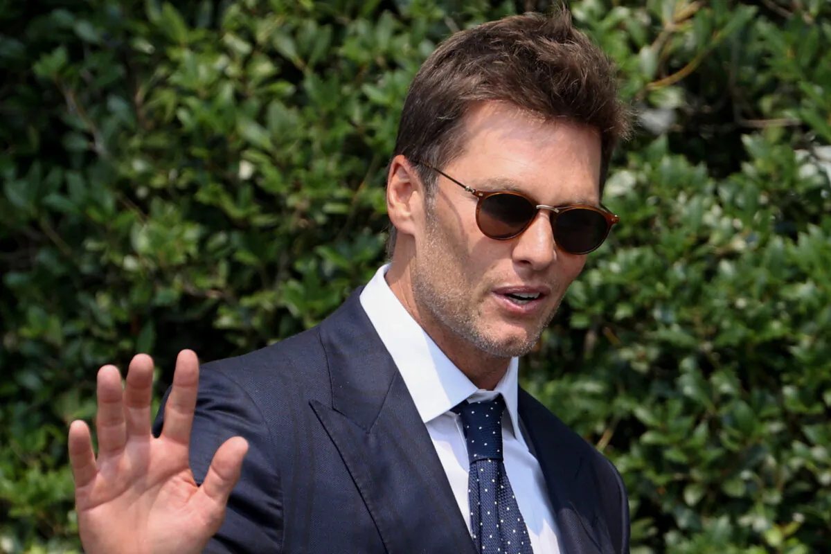 Tampa Bay Buccaneer quarterback Tom Brady gestures during a reception for the team with President Joe Biden at the White House on July 20, 2021. (Jonathan Ernst/Reuters)