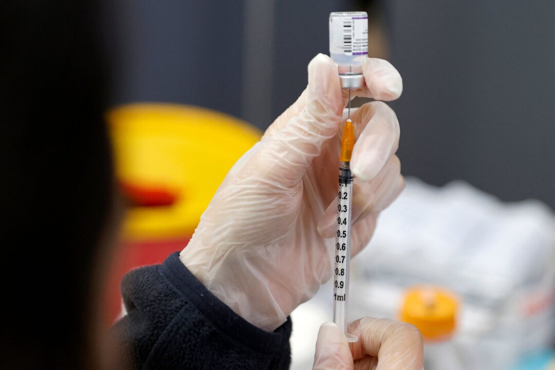 A medic prepares a dose of the Pfizer-BioNTech COVID-19 vaccine in Netanya, Israel on Jan. 5, 2022. (Jack Guez/AFP via Getty Images)