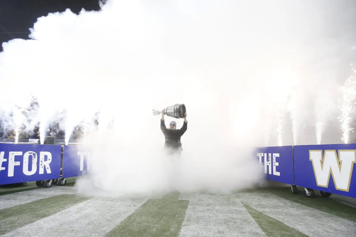 Winnipeg Blue Bombers quarterback Zach Collaros (8) celebrates after their Grey Cup win on Sunday over the Hamilton Tiger-Cats during a Grey Cup celebration at their stadium in Winnipeg, Dec. 15, 2021. (The Canadian Press/John Woods)
