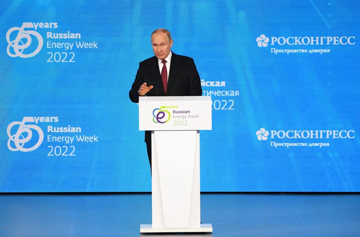 Russian President Vladimir Putin addresses a plenary session of the Russian Energy Week forum in Moscow on Oct. 12, 2022. (Alexey Maishev/Sputnik/AFP via Getty Images)