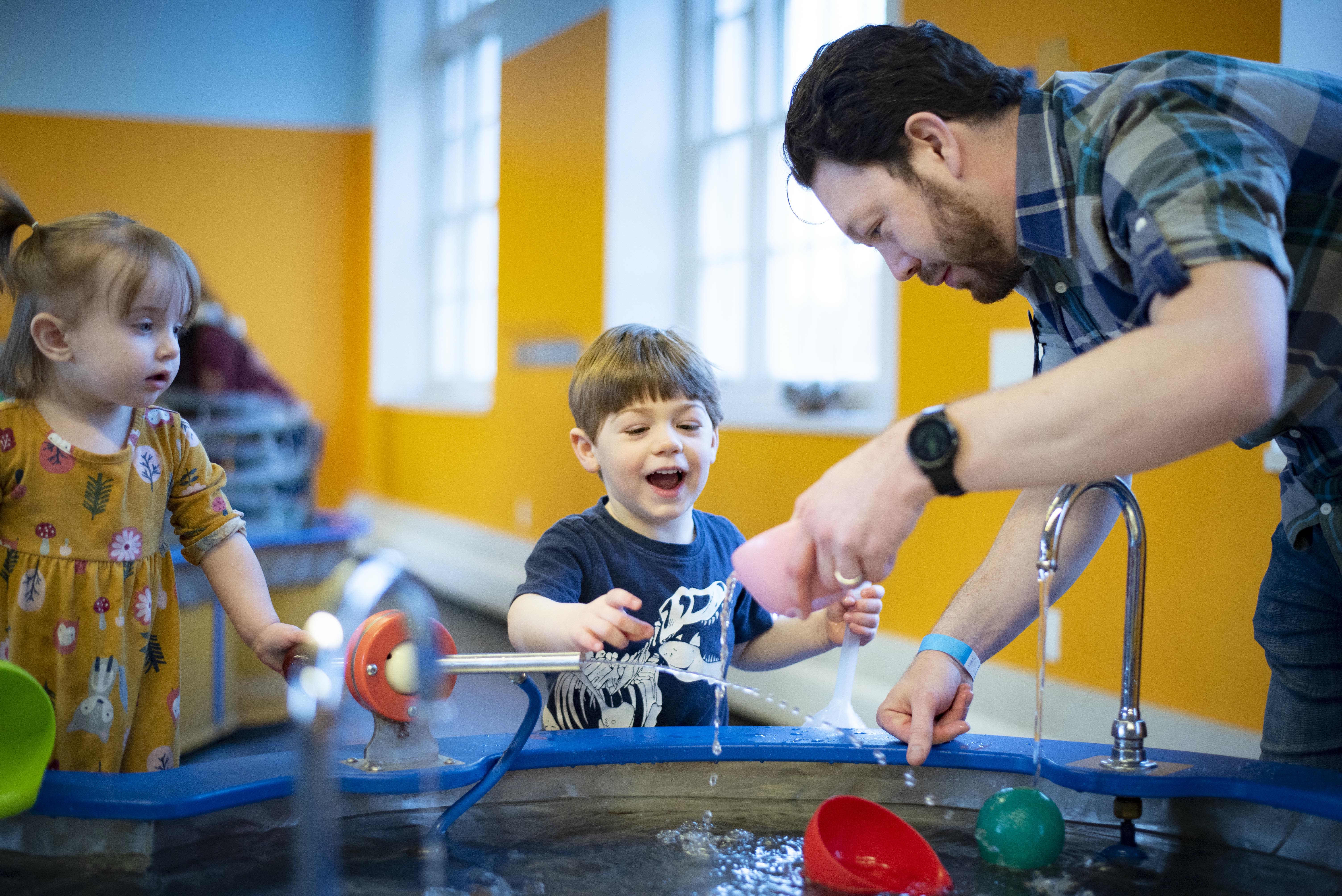 A family at the The Center of Science and Industry Museum