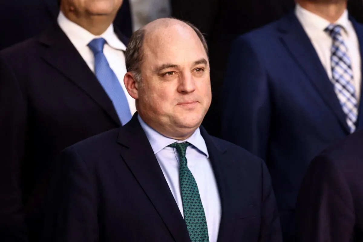 Britain's Secretary of State for Defence, Ben Wallace, poses for a group picture on the second day of a NATO Defence Ministers meeting at NATO Headquarters in Brussels on Oct. 13, 2022. (Kenzo Tribouillard/AFP via Getty Images)