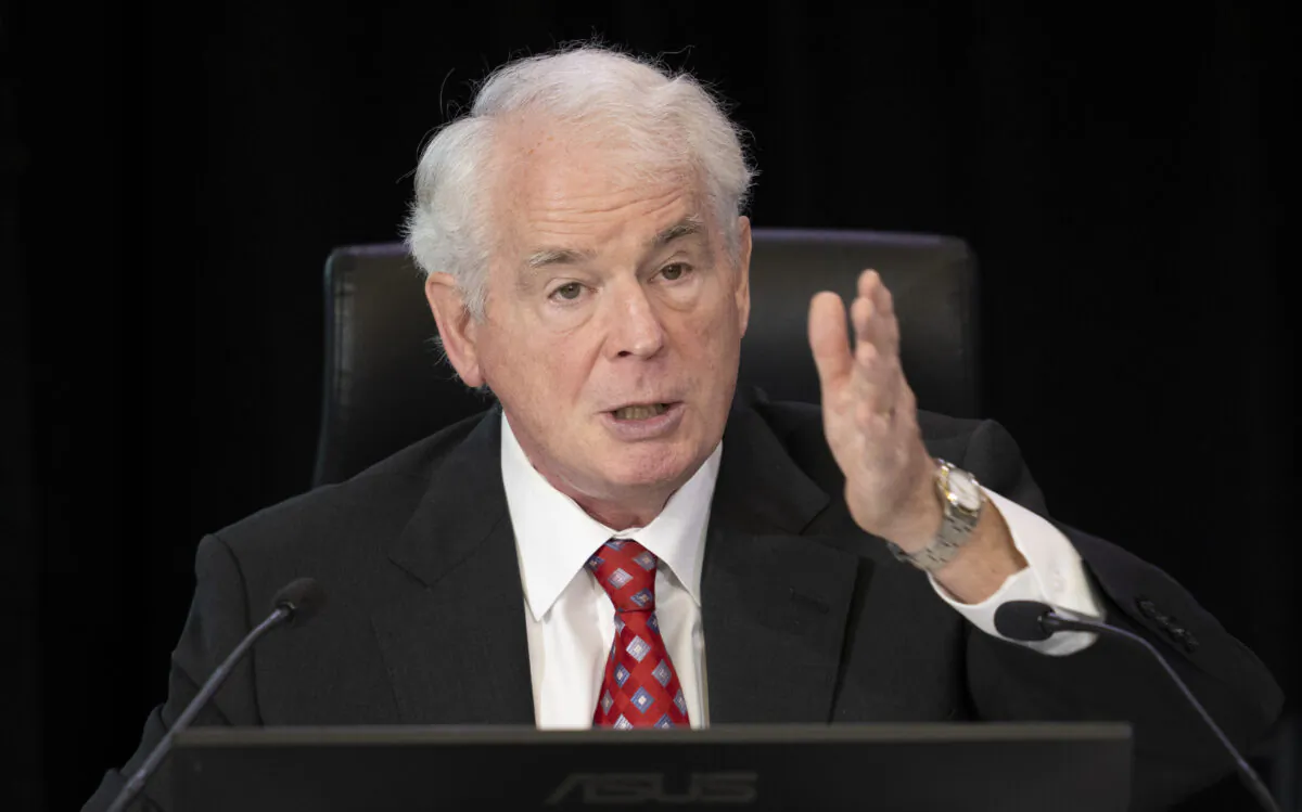 Commissioner Paul Rouleau speaks during the first day of hearings at the Public Order Emergency Commission inquiry, in Ottawa, on Oct. 13, 2022. (Adrian Wyld/The Canadian Press)