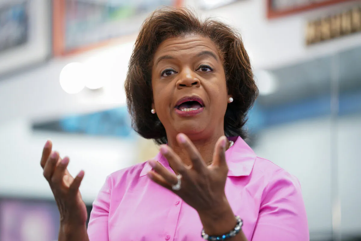 Democratic Senate candidate Cheri Beasley is polling slightly behind Republic Ted Budd in a tight race for Senate in North Carolina. Here she speaks with potential voters at Fourth Ward Barber & Hairstyle in Charlotte, N.C. on Sept. 17, 2022. (Photo by Sean Rayford/Getty Images)