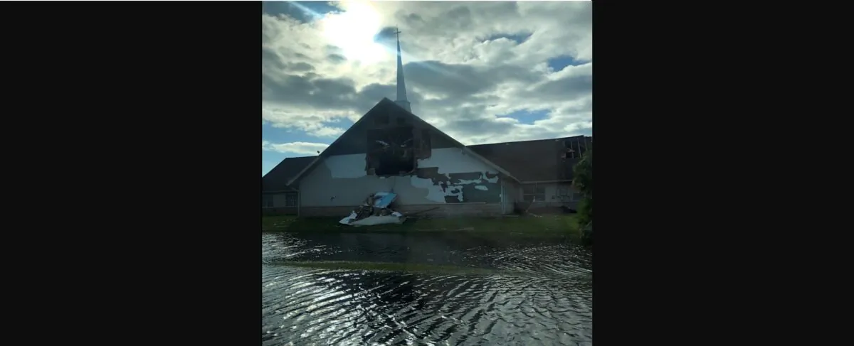 Photo of what remains of Hope Lutheran Church on the flooded street in the community of Gulf Cove in Port Charlotte, Florida in the aftermath of hurricane Ian on Sept. 29, 2022. (Courtesy of Michelle Chacon)