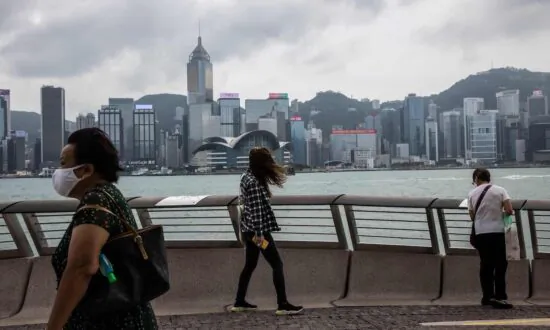 Hong Kong Reduces COVID Measures as Its International Shine Dims