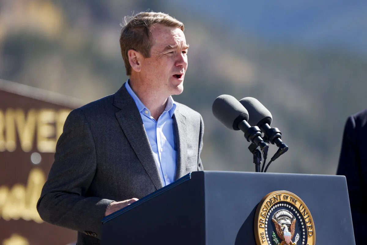 Sen. Michael Bennett (D-Colo.) gives a speech before President Joe Biden designates Camp Hale as a national monument in Red Cliff, Colo., on Oct. 12, 2022. (Michael Ciaglo/Getty Images)