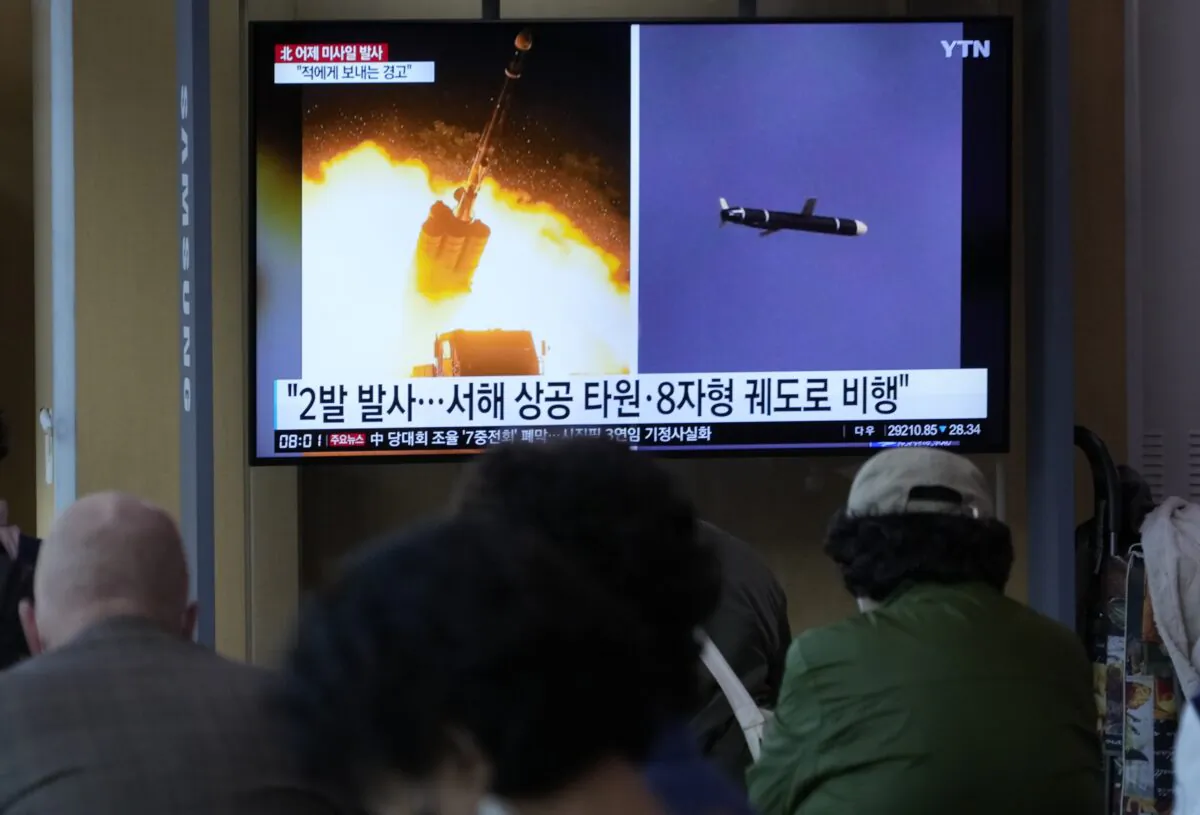 A TV screen shows file images of North Korea's missile launch during a news program at the Seoul Railway Station in Seoul, South Korea, on Oct. 13, 2022. (Ahn Young-joon/AP Photo)