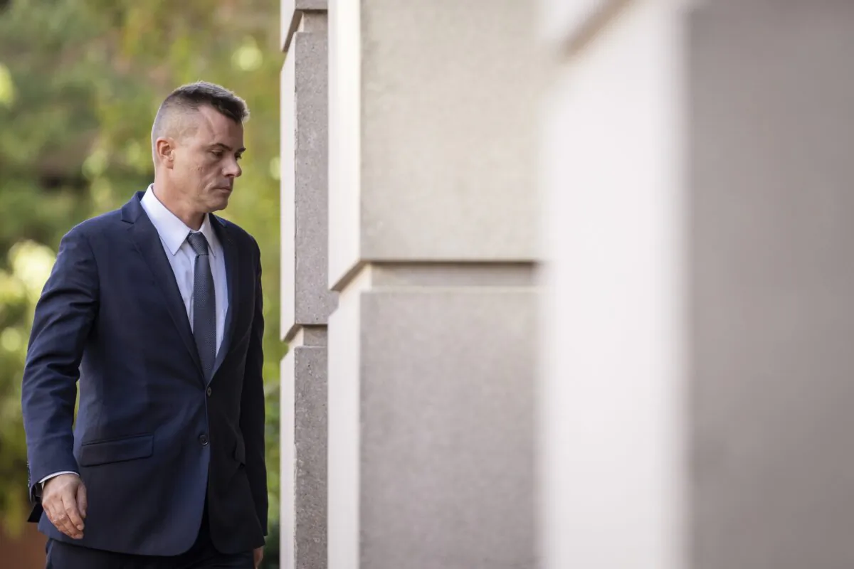 Russian analyst Igor Danchenko walks to the Albert V. Bryan U.S. Courthouse in Alexandria, Va., on Oct. 11, 2022. (Drew Angerer/Getty Images)