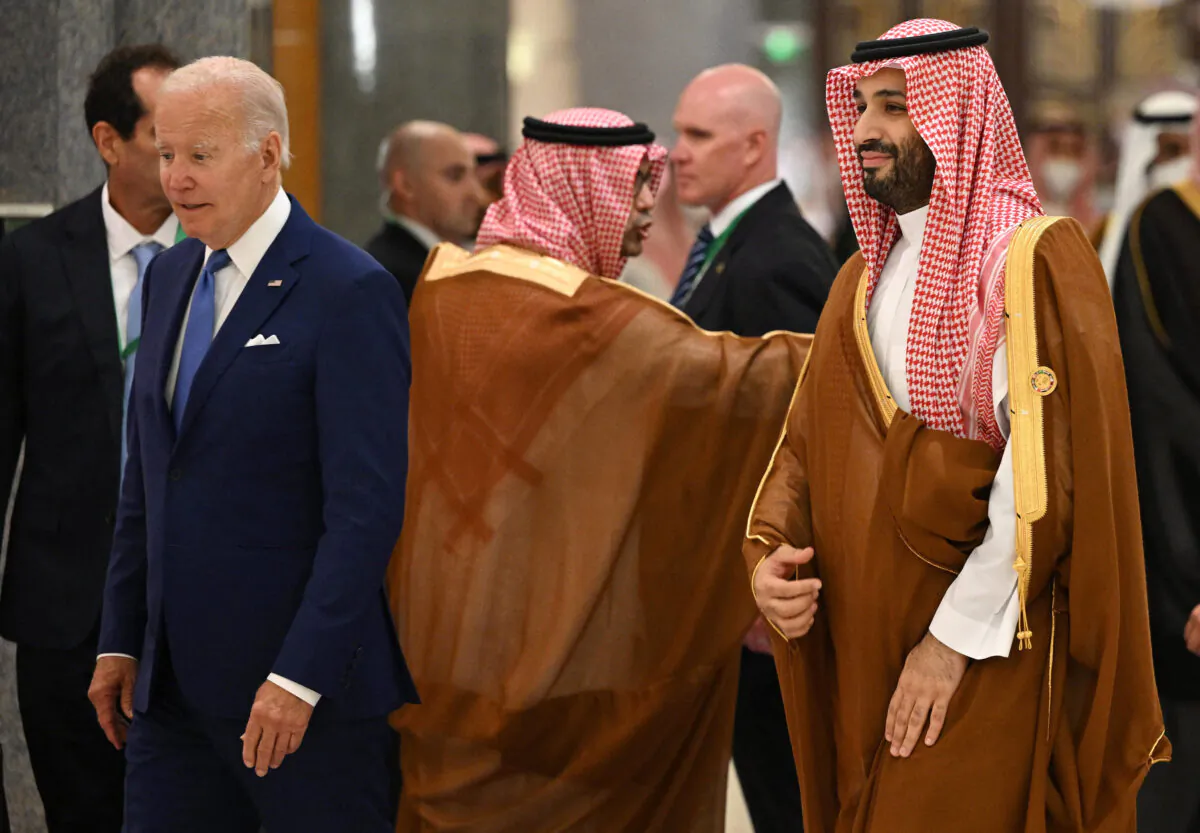 U.S. President Joe Biden (L) and Saudi Crown Prince Mohammed bin Salman (R) arrive for the family photo during the Jeddah Security and Development Summit (GCC+3) at a hotel in Saudi Arabia’s Red Sea coastal city of Jeddah on July 16, 2022. (Mandel Ngan/Pool/AFP/Getty Images)