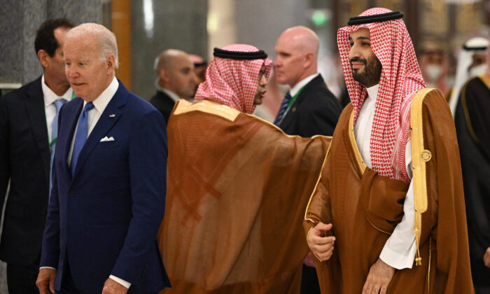 U.S. President Joe Biden (L) and Saudi Crown Prince Mohammed bin Salman (R) arrive for the family photo during the Jeddah Security and Development Summit (GCC+3) at a hotel in Saudi Arabia’s Red Sea coastal city of Jeddah on July 16, 2022. (Mandel Ngan/Pool/AFP/Getty Images)