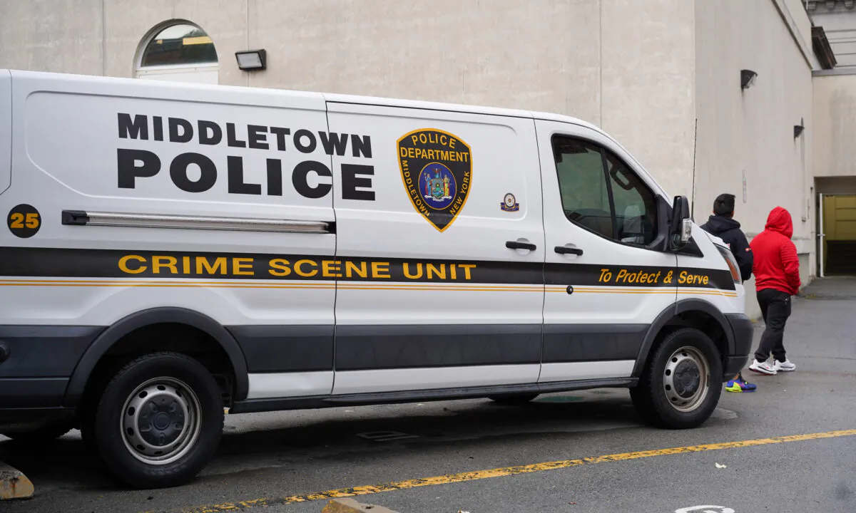 A police crime scene unit vehicle parks outside the Middletown Police Department in N.Y. on Oct. 13, 2022. (Cara Ding/The Epoch Times)