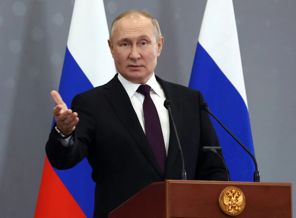 Russian President Vladimir Putin gestures during a press conference after attending a summit with leaders of post-soviet countries of the Commonwealth of Independent States (CIS) in Astana on Oct. 14, 2022. (Valery Sharifulin/SPUTNIK/AFP via Getty Images)