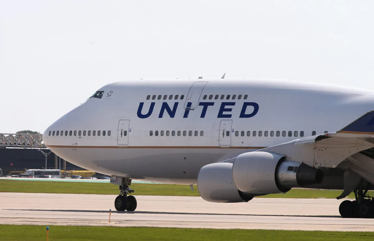 A United Airlines jet taxis at O'Hare International Airport in Chicago on Sept. 19, 2014. (Scott Olson/Getty Images)