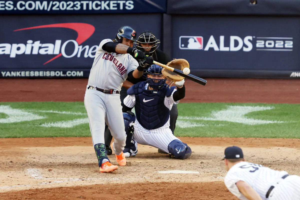 Jose Ramirez (11) of the Cleveland Guardians hits a double during the tenth inning against the New York Yankees in game two of the American League Division Series at Yankee Stadium in New York, on Oct. 14, 2022. (Jamie Squire/Getty Images)