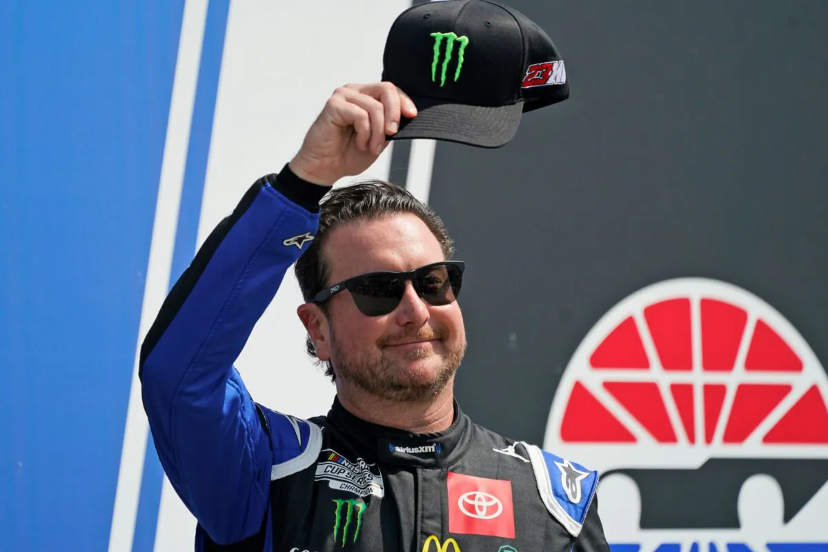 NASCAR Cup Series driver Kurt Busch tips his cap prior to the NASCAR Cup Series auto race at the New Hampshire Motor Speedway, in Loudon, N.H., on July 17, 2022. (Charles Krupa/AP Photo)