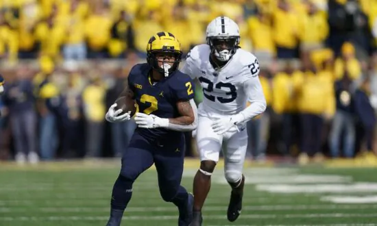 No. 5 Michigan Tops No. 10 Penn St 41–17, Runs for 418 Yards
