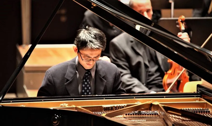 Hong Kong musician and painter, Ricker Choi, who emigrated to Canada when he was 13, will hold a piano concert titled "HK-Freedom Rhapsody," dedicated to the history of Hong Kong people's pursuit of freedom, in Toronto, on Nov. 5, 2022. (Courtesy of Ricker Choi)