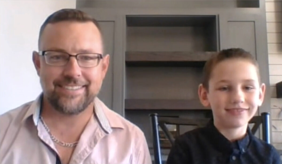 Dominic D'Andrea (R) and his father in an interview with NTD, in a still from video released on Oct. 17, 2022. (NTD)
