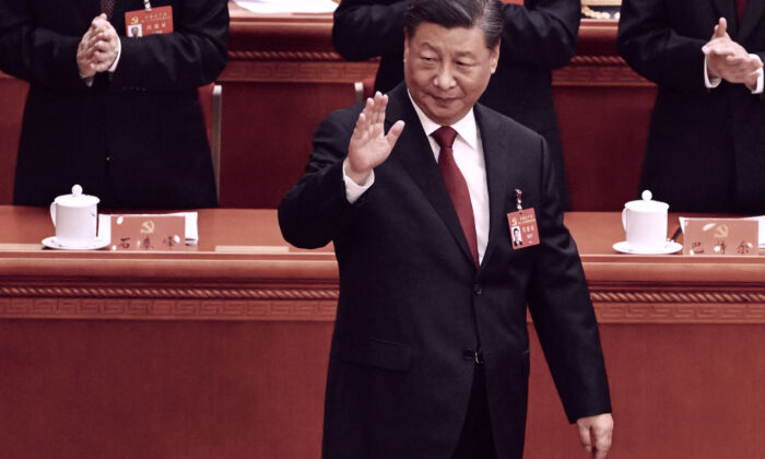 China's leader Xi Jinping waves as he arrives for the opening session of the 20th Chinese Communist Party's Congress in Beijing on Oct.16, 2022. (Noel Celis / AFP via Getty Images)