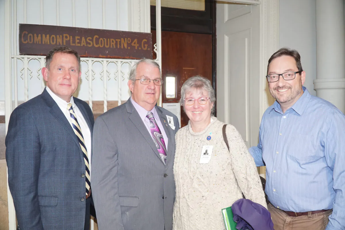 A hearing in a lawsuit challenging Philadelphia's use of taxpayer money to pay for abortions was held at the Philadelphia Court of Common Pleas on Oct. 14, 2022. From left: Attorney Thomas E. Breth, Charles P. Kuhar, Sr., Theresa M. Kuhar, and Tom Stevens, President of the Pro-Life Union of Greater Philadelphia. (Lily Sun/The Epoch Times)