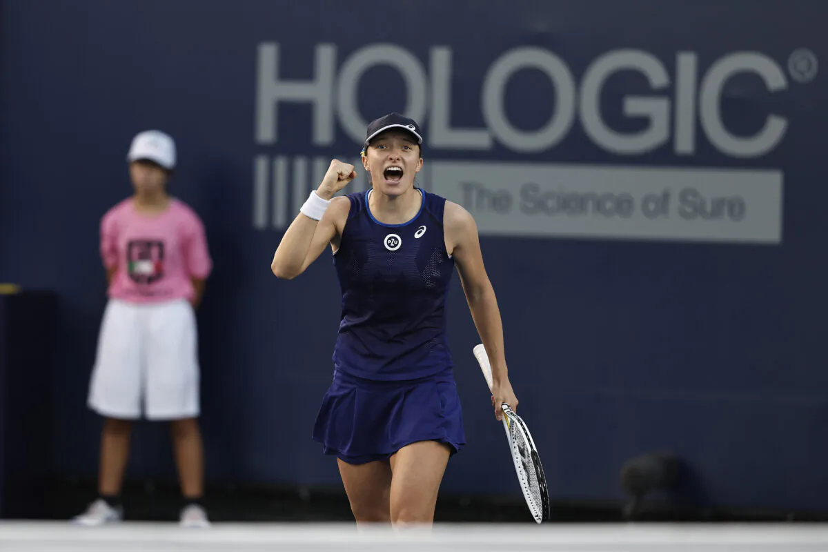 Iga Swiatek of Poland celebrates after defeating Donna Vekic of Croatia in the women's singles final during Day 7 of the San Diego Open, part of the Hologic WTA Tour, at Barnes Tennis Center in San Diego on Oct. 16, 2022. (Michael Owens/Getty Images)