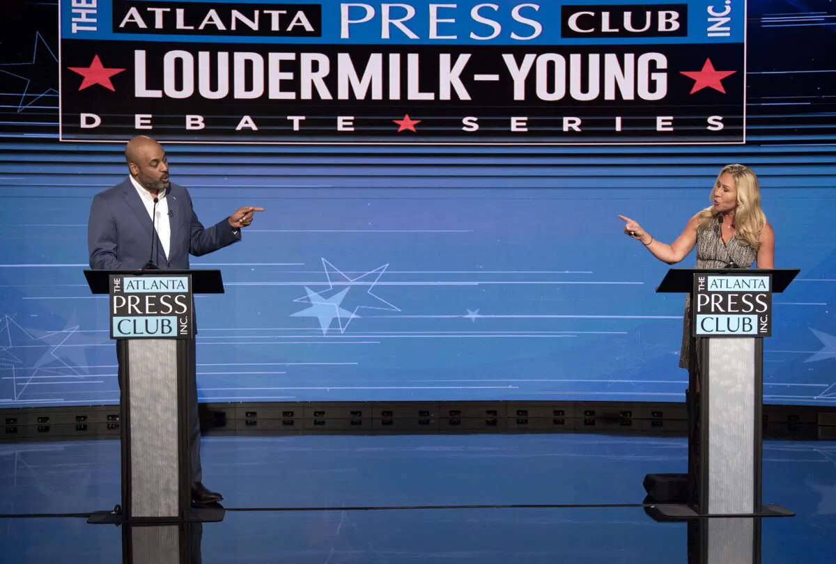 Democratic Congressional candidate for Georgia's 14th District Marcus Flowers debates the incumbent Rep. Marjorie Taylor Greene in the Atlanta Press Club Loudermilk-Young General Election Debate Series held at the studios of Georgia Public Broadcasting in Atlanta, Ga., on Oct. 16, 2022. (Brian Cahn/ZUMA Press Wire)