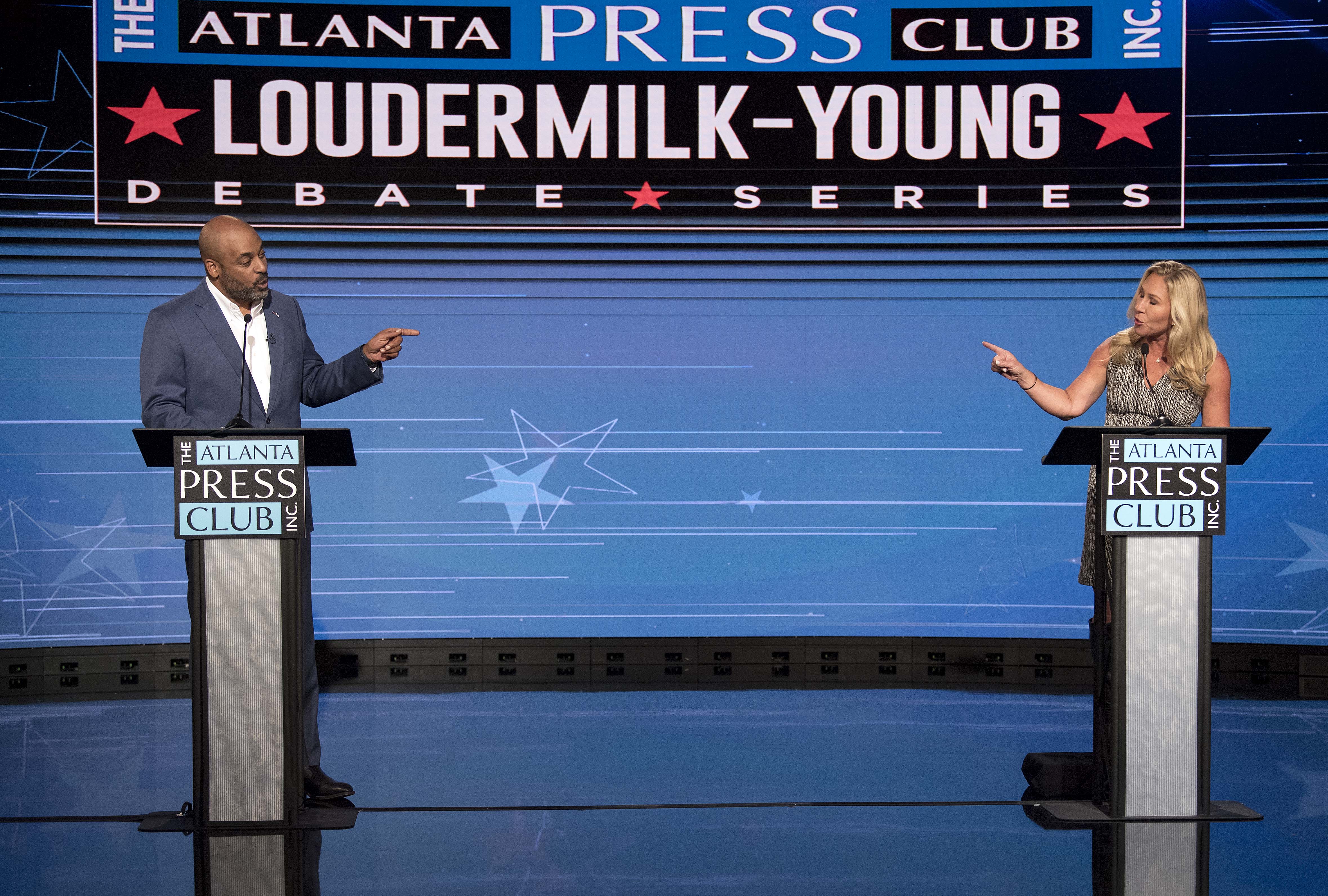 Georgia Rep. Marjorie Taylor Greene and Marcus Flowers Square Off in Heated Debate - Vimarsana News
