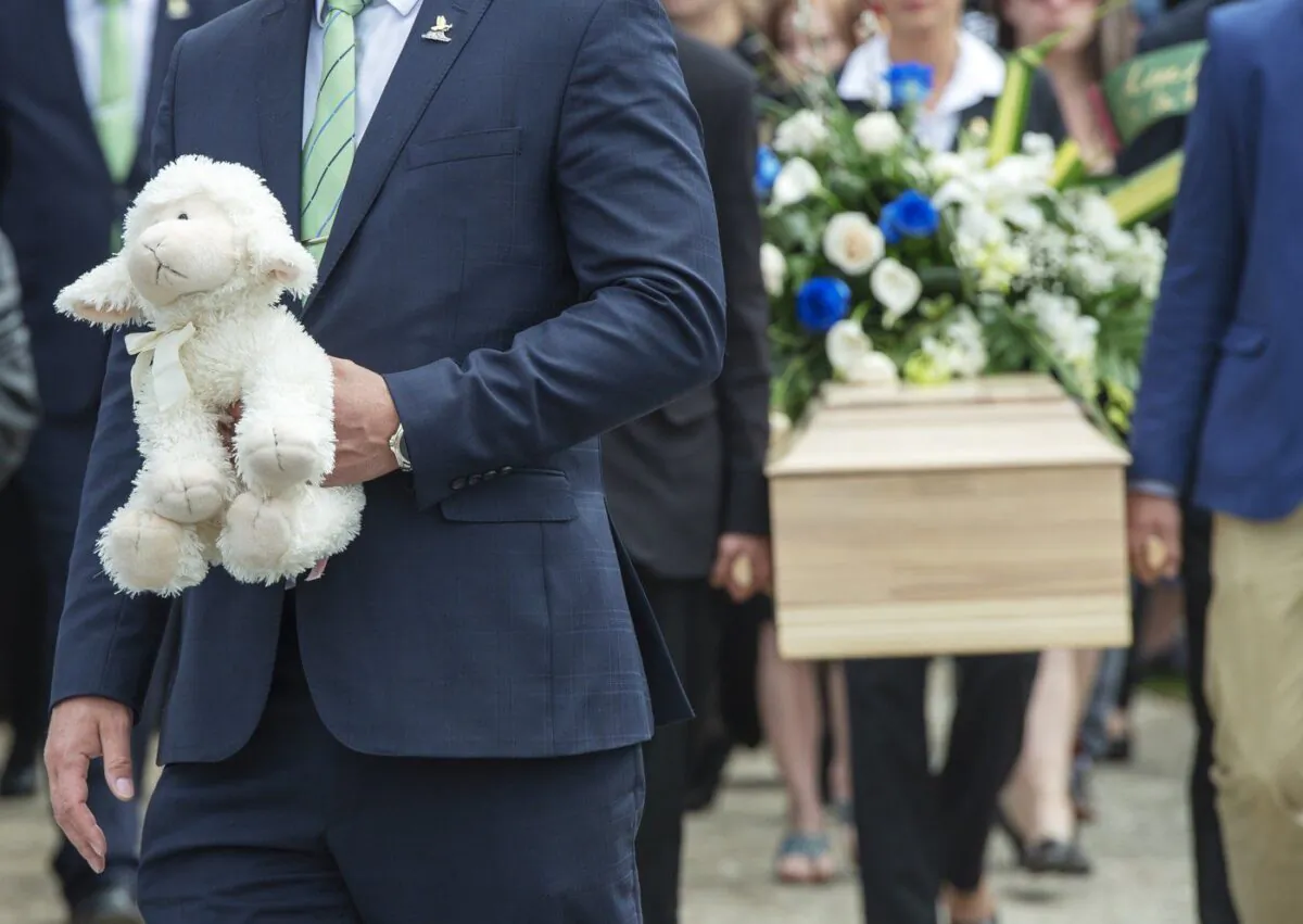 The casket of a seven-year-old girl who was found in critical condition inside of a home and later died is carried from the church after funeral services, May 9, 2019 in Granby, Que. (The Canadian Press/Ryan Remiorz)
