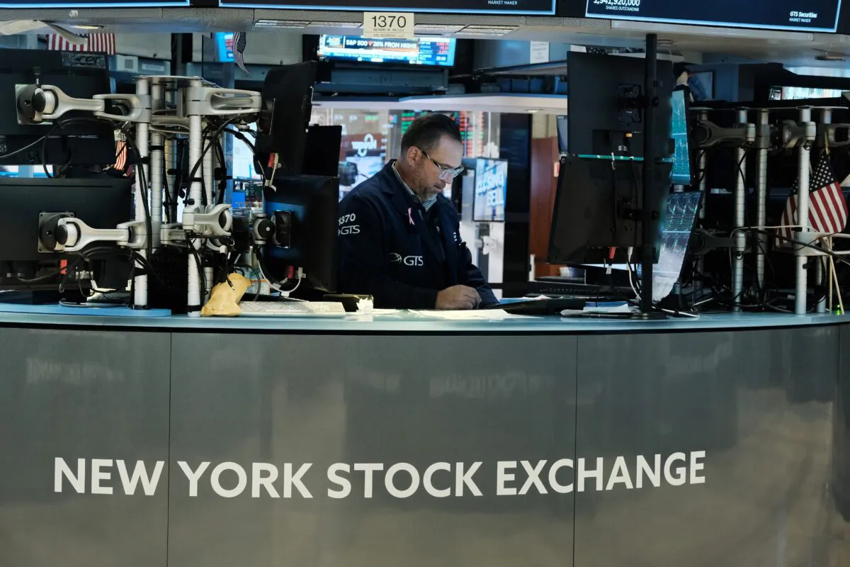 Traders work on the floor of the New York Stock Exchange (NYSE) on Oct. 14, 2022 in New York City. (Spencer Platt/Getty Images)