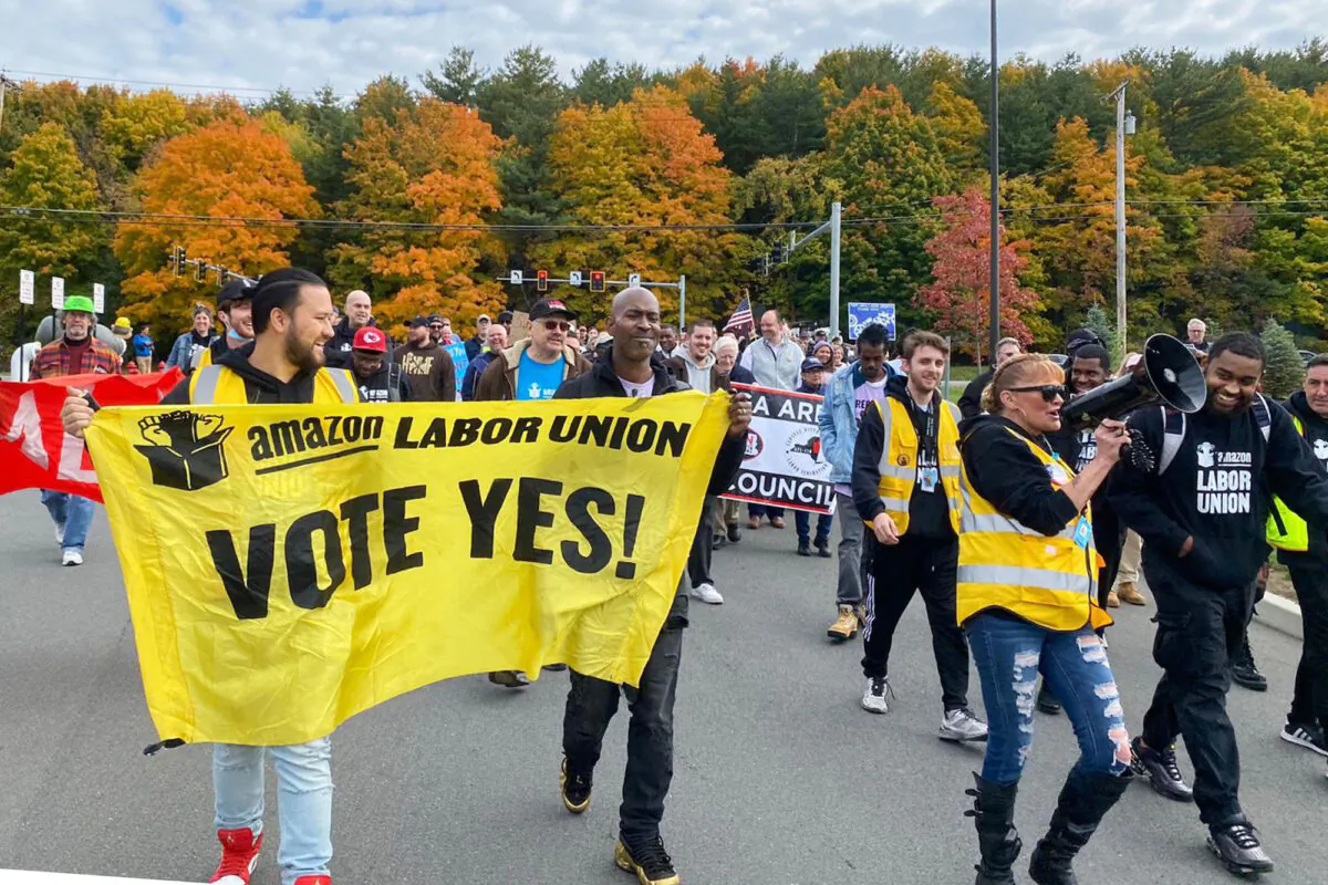 Amazon workers and supporters march during a rally in Castleton-On-Hudson, New York, on Oct. 10, 2022. (Rachel Phua via AP)
