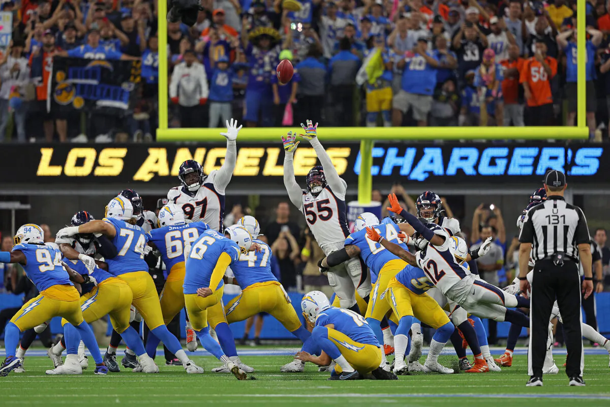 Dustin Hopkins (6) of the Los Angeles Chargers kicks the game winning field goal in overtime to defeat the Denver Broncos at SoFi Stadium in Inglewood, Calif., on Oct. 17, 2022. (Harry How/Getty Images)