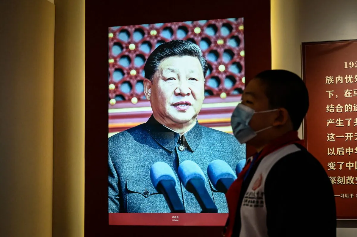 An image of China's leader Xi Jinping is seen at an exhibition about history of the Communist Party of China (CPC) at Red Building of Peking University, in Beijing on Oct. 7, 2022. (Jade Gao/AFP via Getty Images)