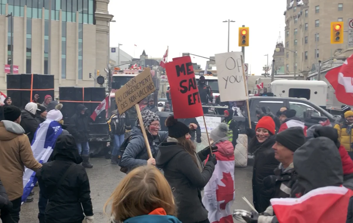 A dance party is held at the intersection of Rideau and Sussex St. in Ottawa on Feb. 6, 2022, during the Freedom Convoy protest. (Noé Chartier/The Epoch Times)