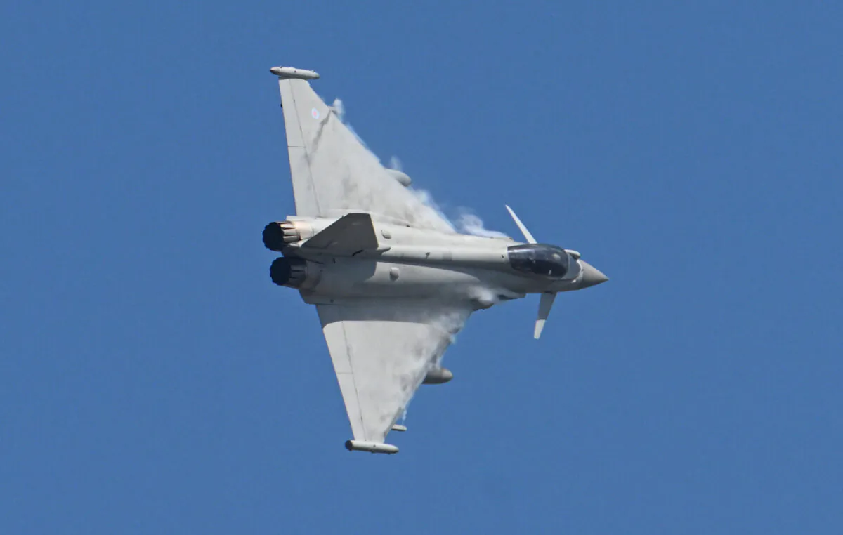 A Typhoon jet of the Royal Air Force flies over the Mihail Kogalniceanu Air Base near Constanta, Romania, on April 8, 2022. (Daniel Mihailescu /AFP via Getty Images)