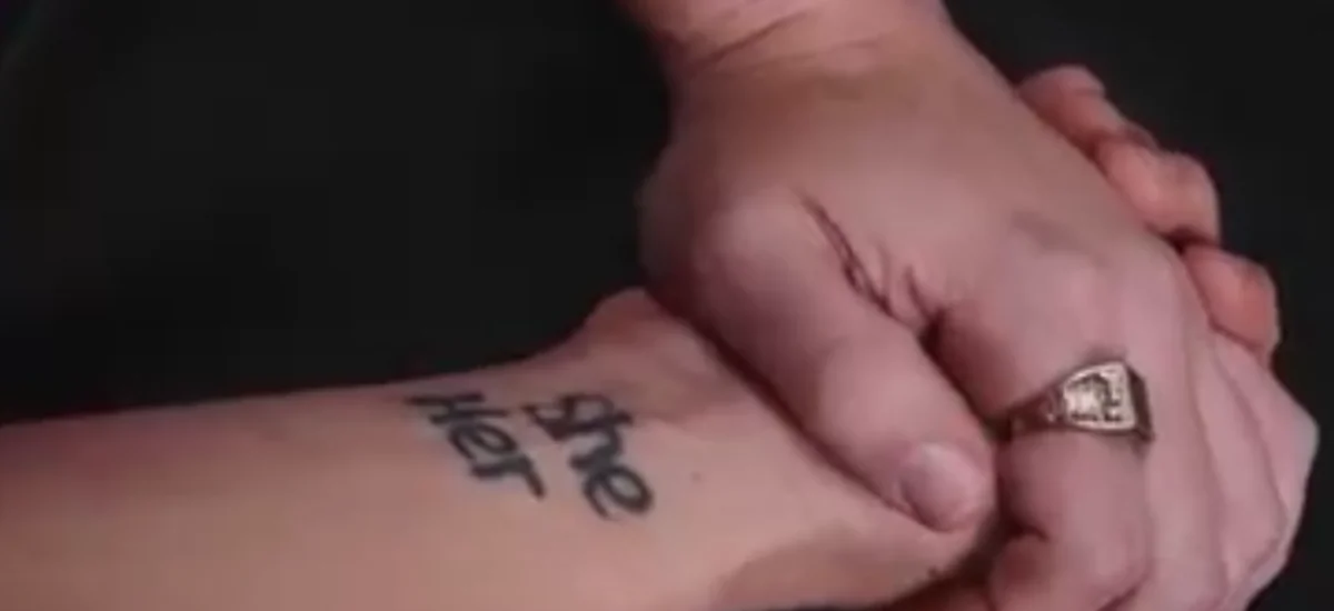 Estee Lauder transgender scientist shows off gender pronoun tattoos.