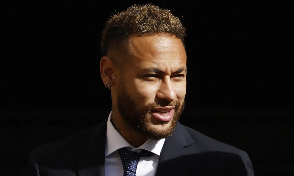 Brazil's Neymar leaves court after standing trial on fraud and corruption charges over the transfer to FC Barcelona from Santos in 2013, in  Barcelona on Oct. 18, 2022. (Albert Gea/Reuters)