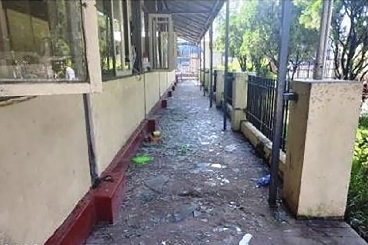 A parcel-reception location at the entrance of the Insein prison sits damaged after an explosion in Yangon, Burma, on Oct. 19, 2022. (Military True News Information Team via AP)