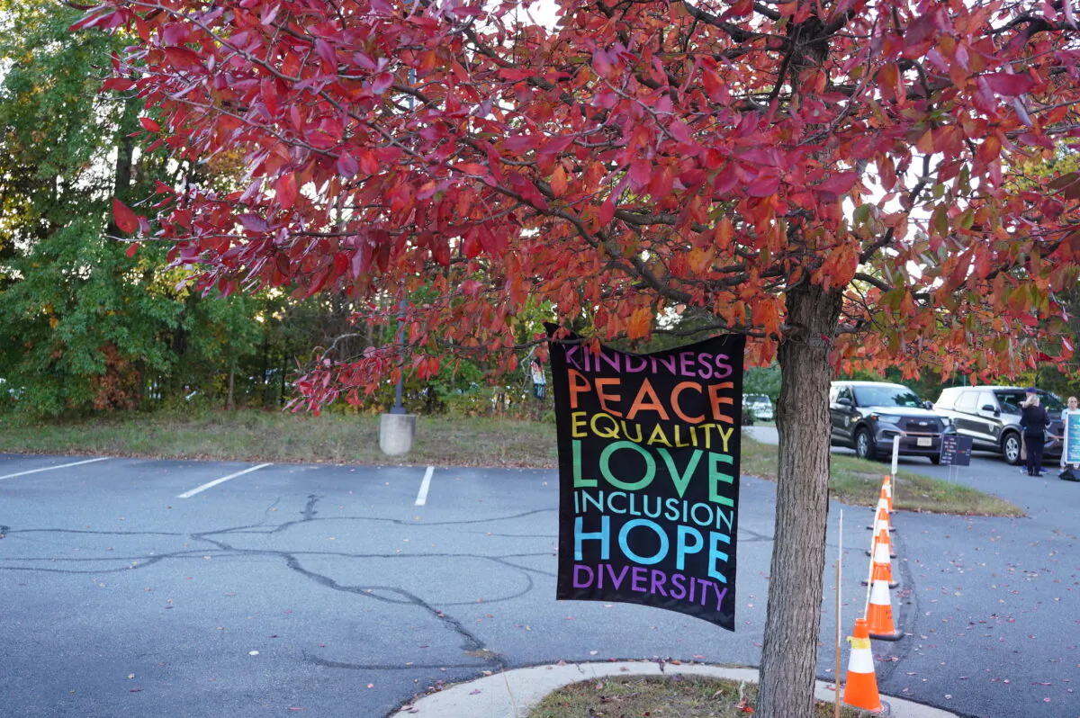 A "kindness, peace, equality, love, inclusion, hope, diversity" sign outside the Loudoun County Public School administration building in Ashburn, Va., on Oct. 11, 2022. (Terri Wu/The Epoch Times)