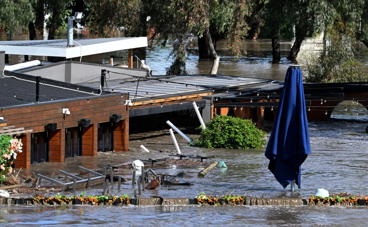 A pub is inundated by water during flooding in the suburb of Maribyrnong in Melbourne, Australia, on Oct. 14, 2022. (William West/AFP via Getty Images)
