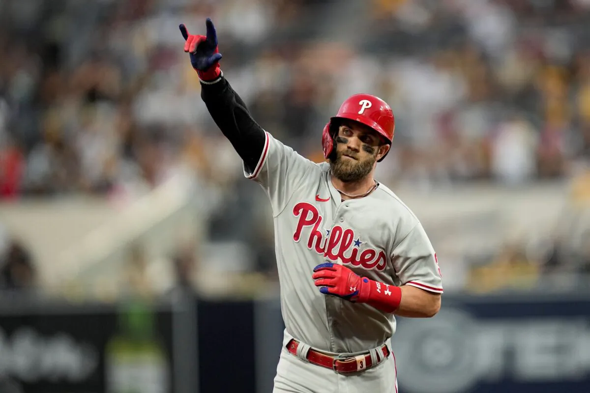 Philadelphia Phillies' Bryce Harper celebrates after a home run during the fourth inning in Game 1 of the baseball NL Championship Series between the San Diego Padres and the Philadelphia Phillies in San Diego on Oct. 18, 2022. (Gregory Bull/AP Photo)