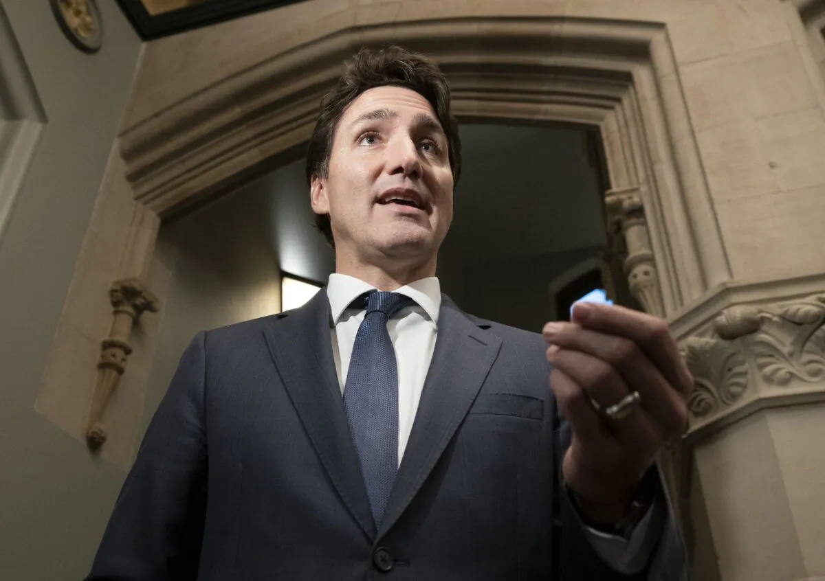 Prime Minister Justin Trudeau speaks with reporters before attending caucus on Parliament Hill, Oct. 19, 2022, in Ottawa. (The Canadian Press/Adrian Wyld)
