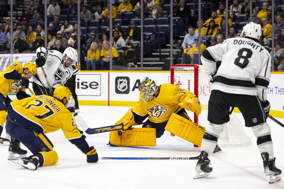 Juuse Saros (74) of the Nashville Predators makes a save against the Los Angeles Kings during overtime at Bridgestone Arena in Nashville, Tenn., on Oct. 18, 2022. (Brett Carlsen/Getty Images) 