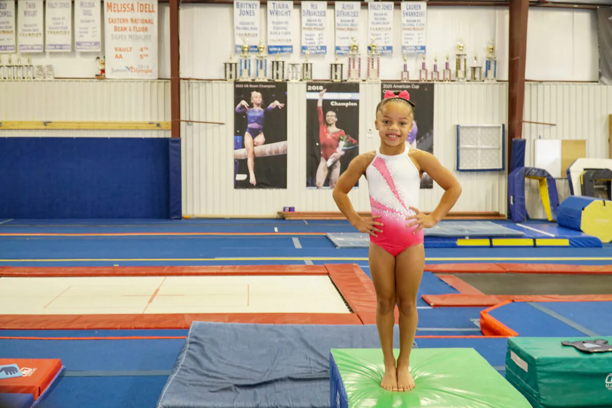 Delilah McDaniel, an 8-year-old Delaware gymnast, at the First State Gymnastics (FSG) on Oct. 12, 2022. (Lily Sun/The Epoch Times)
 

