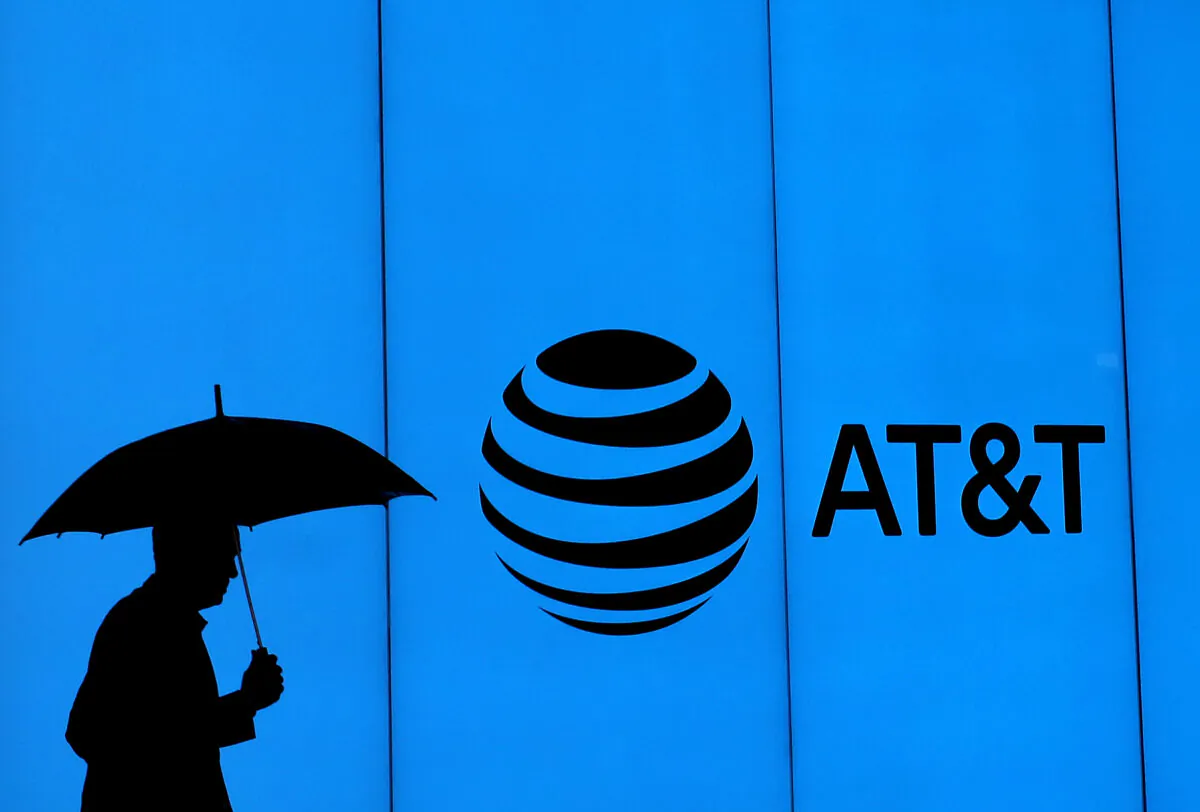 A man walks outside of AT&T headquarters in Dallas, Texas, on March 13, 2020. (Ronald Martinez/Getty Images)