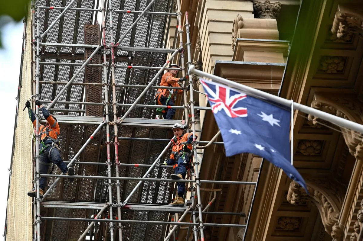 Labourers work at a construction site in Sydney, Australia, on June 18, 2020. (Saeed Khan/AFP via Getty Images)